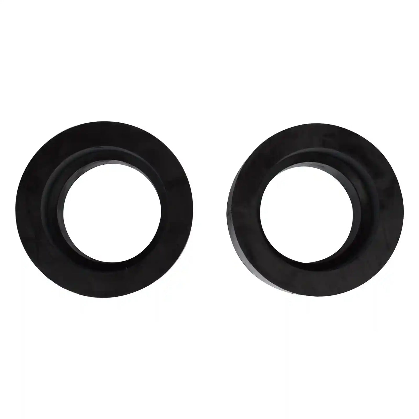 Two black front coil spring spacers