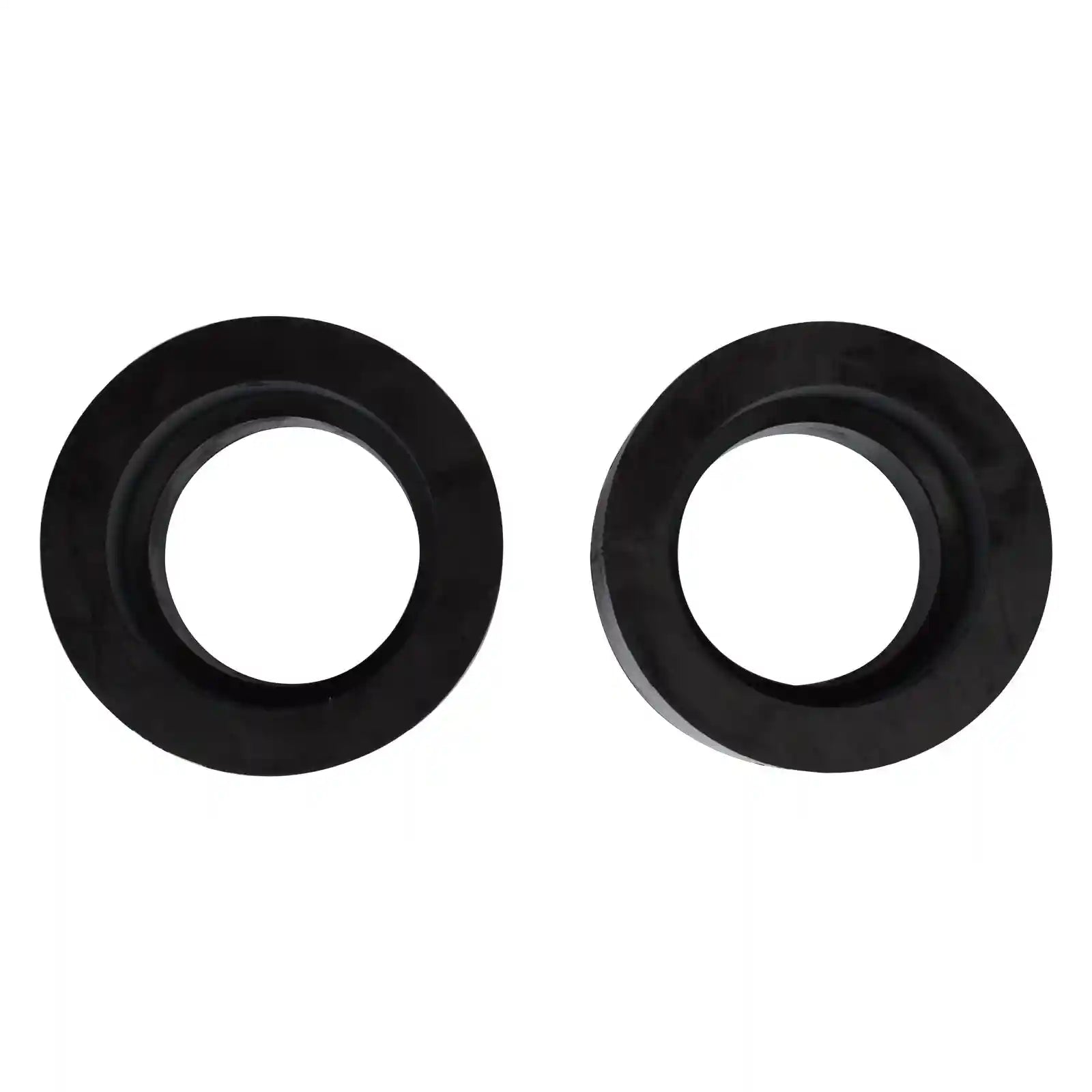 Two black front coil spring spacers