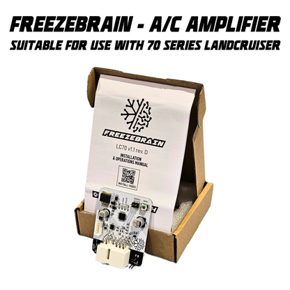 Freezebrain A/C amplifier with packaging and manual on a white background