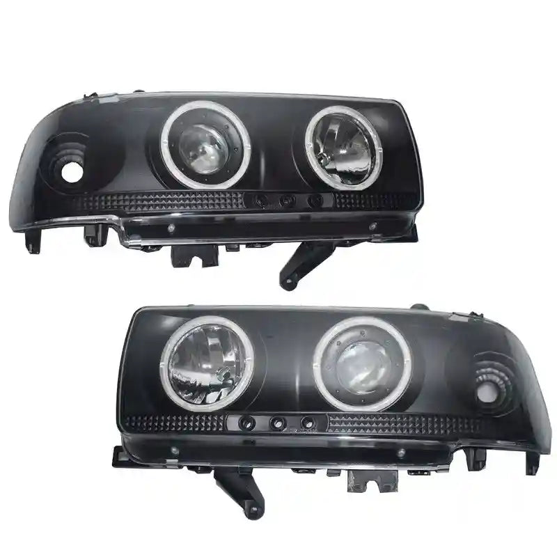 Pair of black Angel Eye Head Lights on a white background