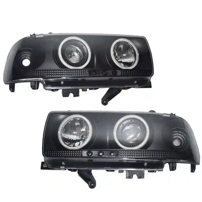 Pair of black Angel Eye Head Lights on a white background