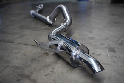 Chrome exhaust system on a concrete floor
