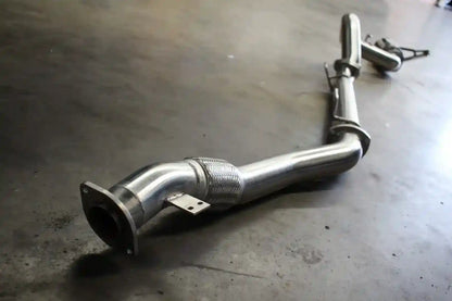 Metallic exhaust pipe on a concrete floor