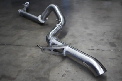 Metallic exhaust pipe system on a concrete floor