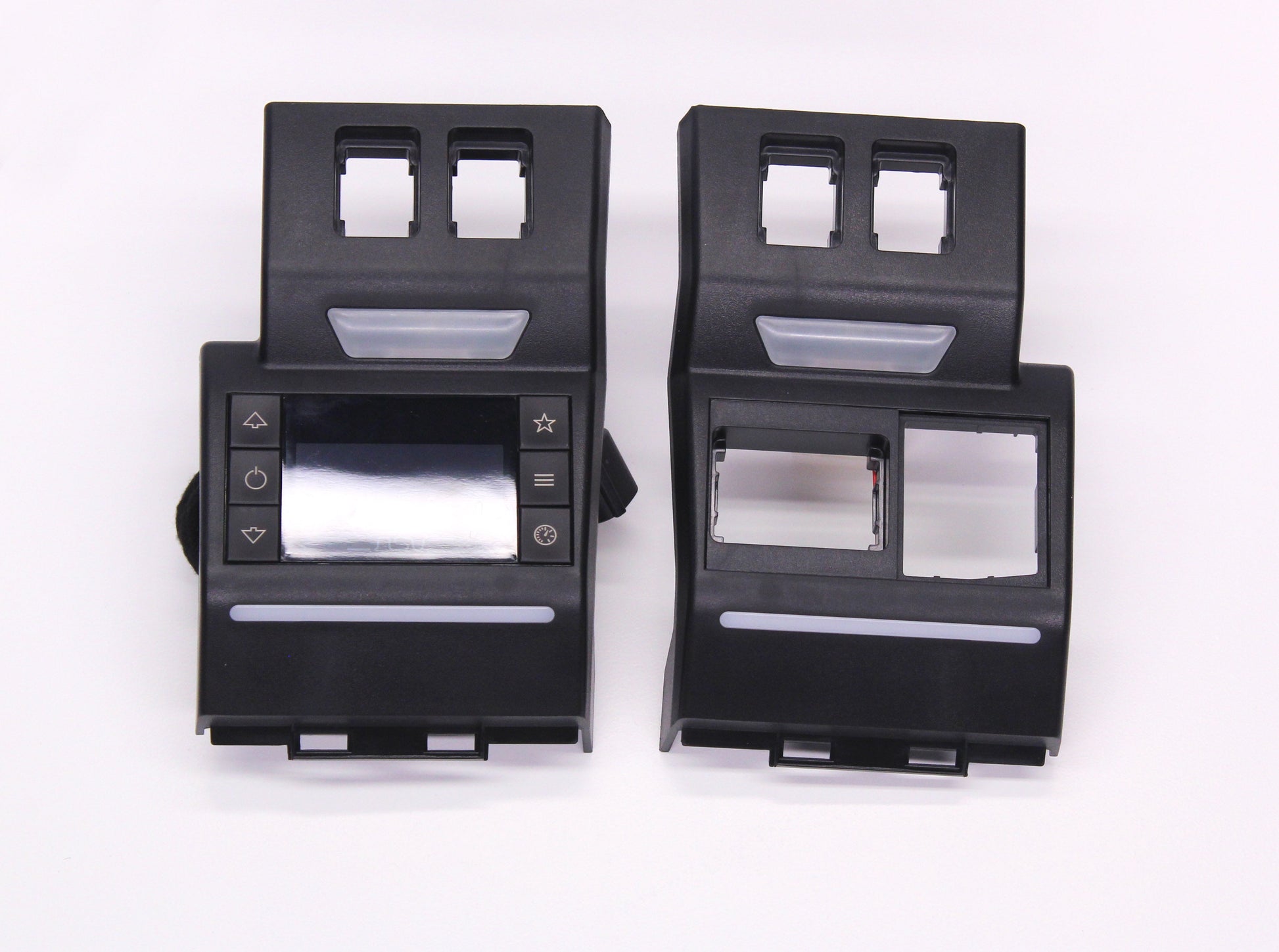 Two black plastic interior parts