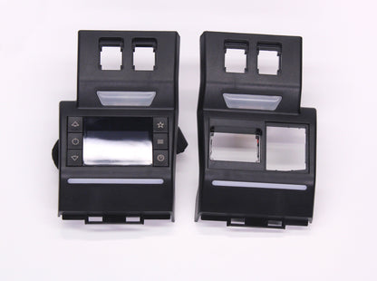 Two black plastic interior parts