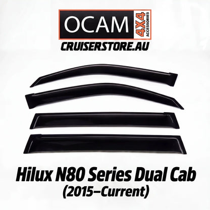 Set of car window deflectors with OCAM Crusierstore branding on a white background