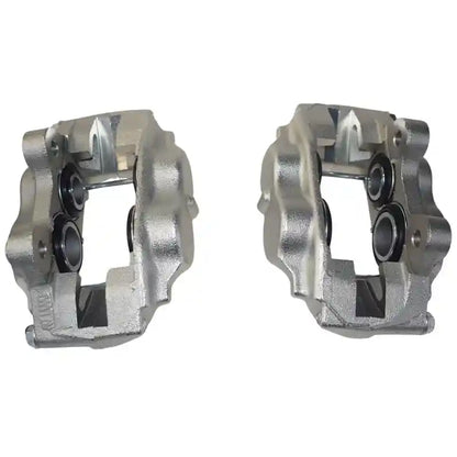 Two metallic mechanical components on a white background