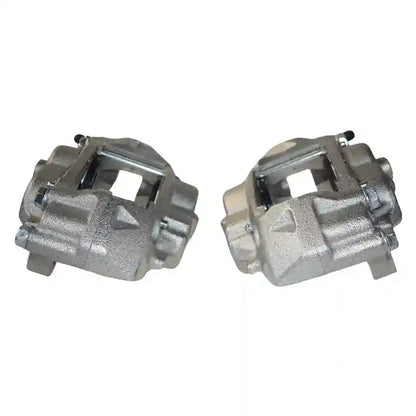 Two metallic brake calipers on a white background
