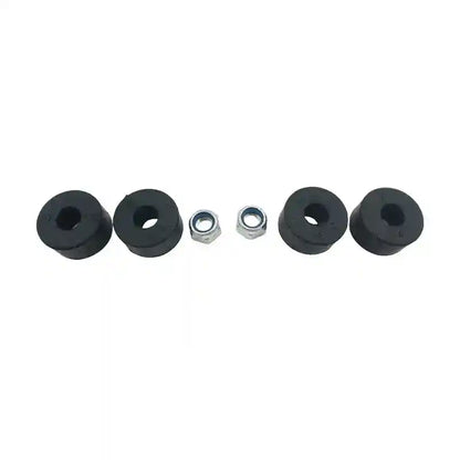 Set of black rubber bushings and metal washers on a white background