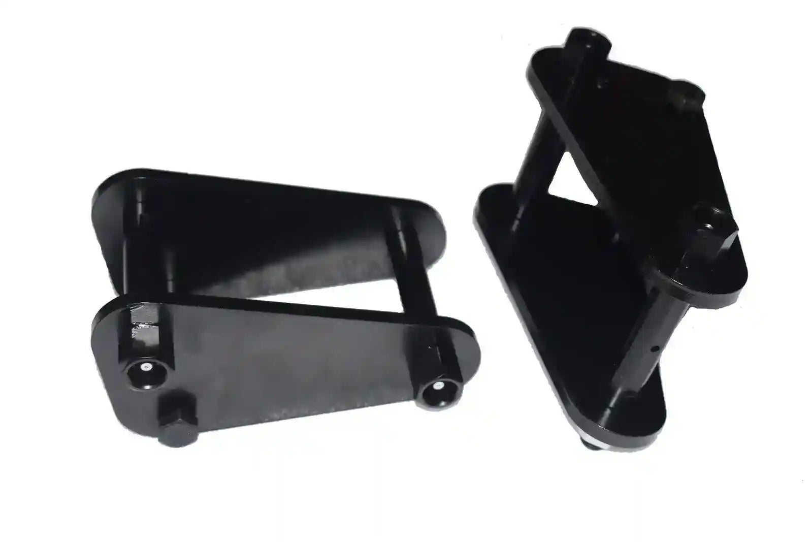 Two black Front Extended Shackles on a white background