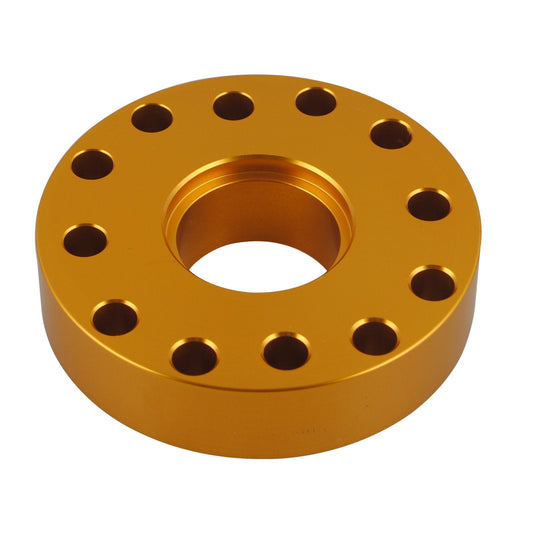 Gold metal flange with multiple holes on a white background