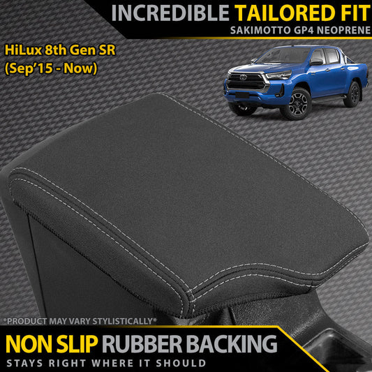 Black armrest cover with Toyota HiLux 8th Gen SR in the background on a textured gray surface.