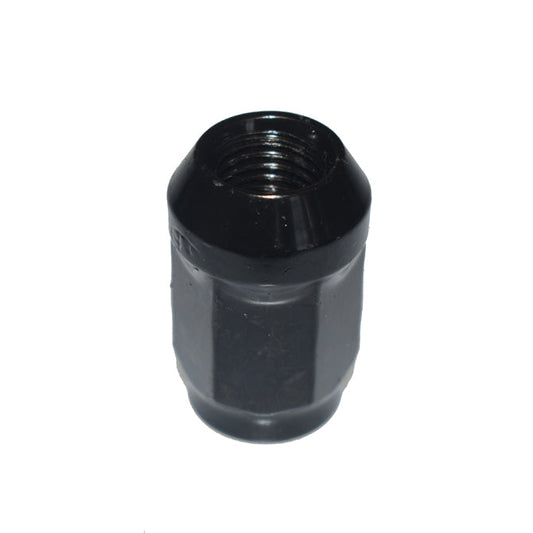 Black metal hex nut on a white background