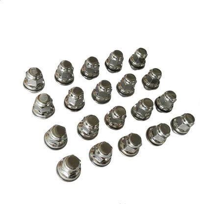 Set of metal lug nuts on a white background