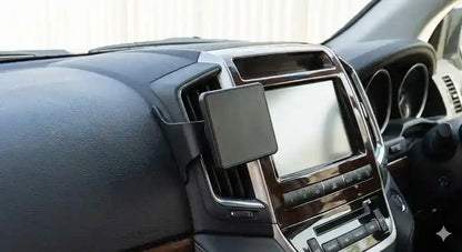 ClicOn angled dash mounting bracket installed on Toyota LandCruiser 200 Series centre console without drillin