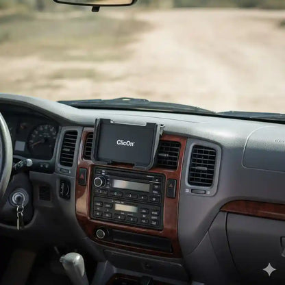 ClicOn centre dash mounting bracket installed above central air vents on a 1998-2002 Toyota LandCruiser 100 Series with no-drill fitmen