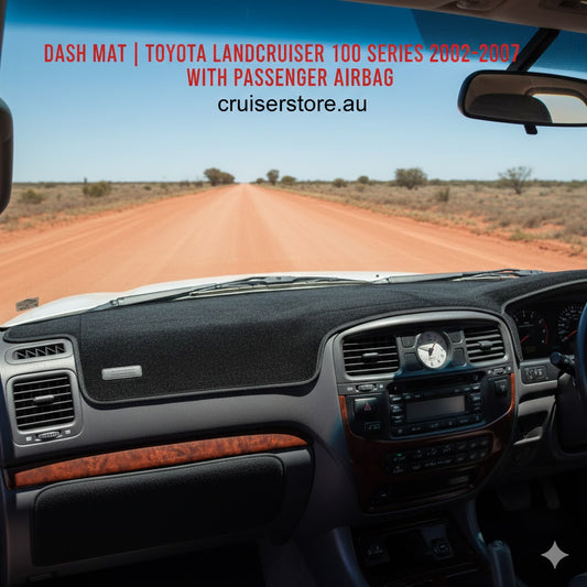 Custom black Dash Cover Company mat installed on a 2002-2007 Toyota LandCruiser 100 Series facelift dashboard