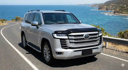 Front view of Silver Pearl Toyota LandCruiser 300 Series Sahara with OCAM Bonnet Protector installed.