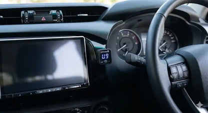 Interior view of Toyota Hilux N80 SR5 dashboard showing Ultimate9 EVC Throttle Controller.